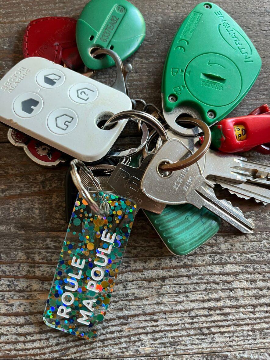 Porte-clefs paillettes Roule ma poule